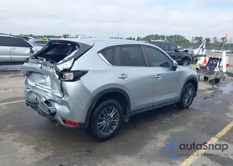 2021 Mazda Cx-5 Touring z USA, uszkodzony, nr VIN JM3KFACM8M0356057